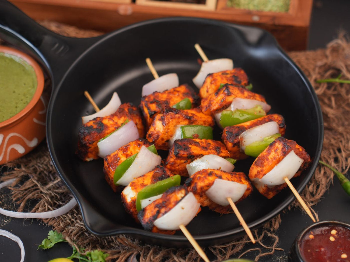 Grilled paneer skewers with peppers and onions