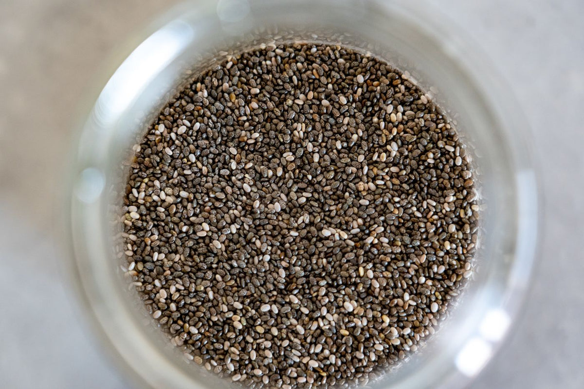 Chia seeds in a glass jar, seen from above