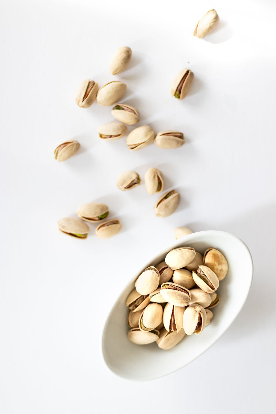 Pistachios in a white bowl